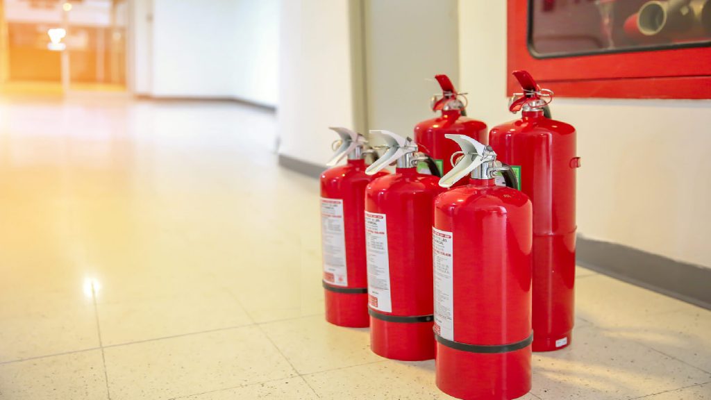 red tank fire extinguisher is powerful industrial concepts emergency safety equipment fire prevention